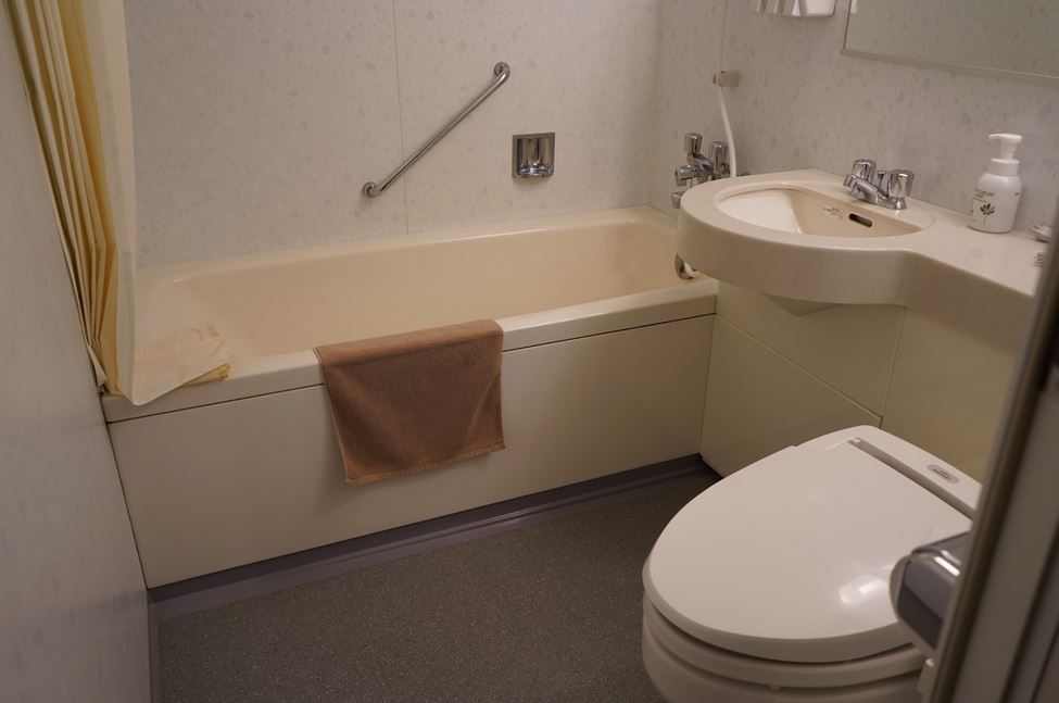 why does toilet bowl water level drop overnight