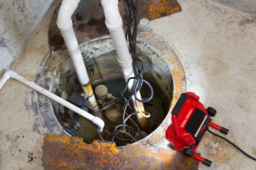 a sump pump installed by Neighborhood Plumbing, Heating, Cooling & Electrical